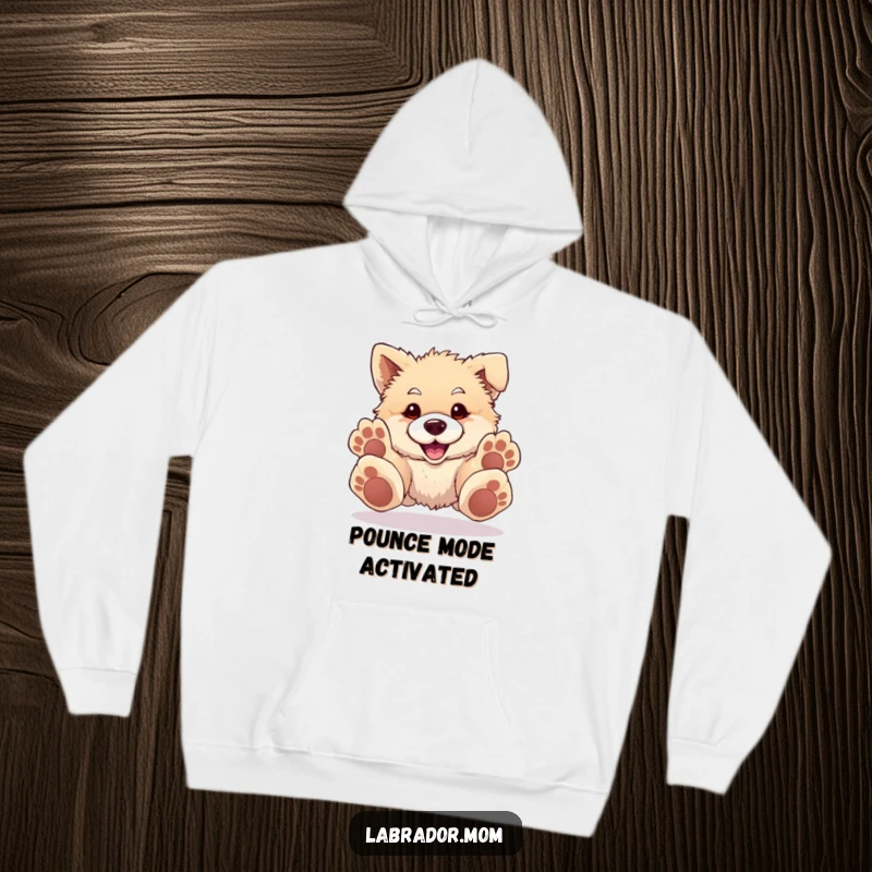 Funny Hoodie depicting a fluffy, happy dog with oversized paws about to pounce, showcasing its adorable and goofy charm.
