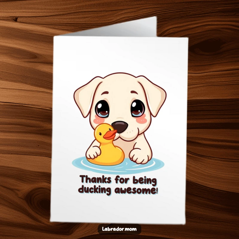 Funny free printable thank you card: Big-eyed kawaii labrador curiously nudges a rubber duck, conveying heartfelt thanks.