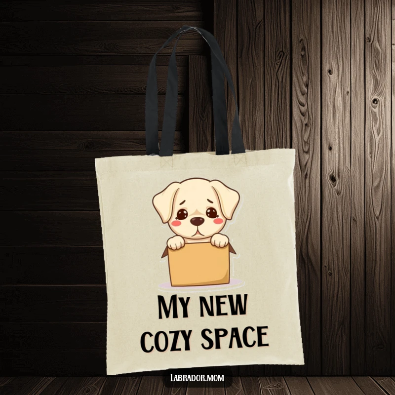 Funny Kawaii Labrador Tote Bag showing a confused dog hilariously trying to fit into a small box, a funny carry-all.